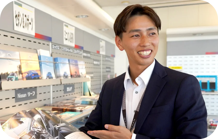 お客様と商談する営業職の社員